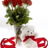 24 Red Roses in a vase with a teddy bear